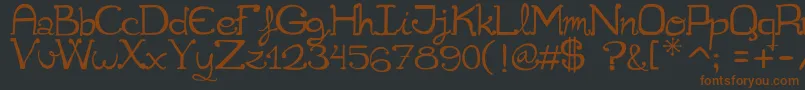 Шрифт Cuqueta – коричневые шрифты на чёрном фоне
