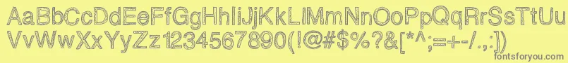 Epicawesomenessscribblz-fontti – harmaat kirjasimet keltaisella taustalla