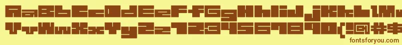 フォント1bMazeb – 茶色の文字が黄色の背景にあります。