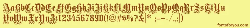 フォントMedicitext – 茶色の文字が黄色の背景にあります。