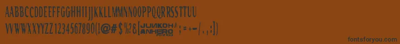 Шрифт Rgmb6044Str – чёрные шрифты на коричневом фоне