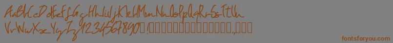 フォントPwoblique – 茶色の文字が灰色の背景にあります。