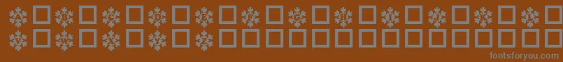 Snowycaps Font – Gray Fonts on Brown Background