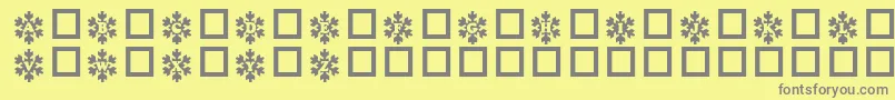 Snowycaps Font – Gray Fonts on Yellow Background