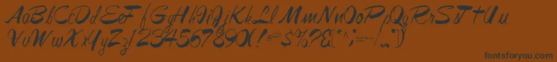 Jesabellfont72Regular Font – Black Fonts on Brown Background