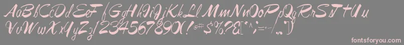 フォントJesabellfont72Regular – 灰色の背景にピンクのフォント