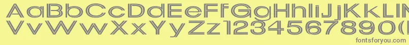 UptightEx Font – Gray Fonts on Yellow Background