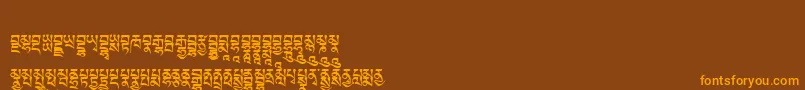 Tibetanmachineweb5 Font – Orange Fonts on Brown Background