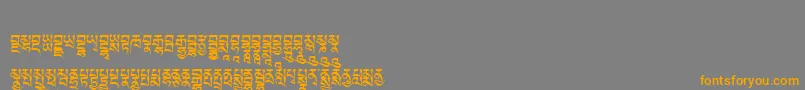 Tibetanmachineweb5 Font – Orange Fonts on Gray Background
