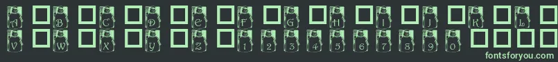 フォントPfSnowman1 – 黒い背景に緑の文字