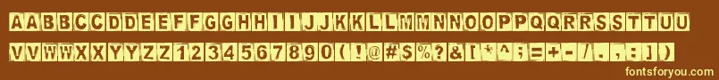 StampedDsg Font – Yellow Fonts on Brown Background