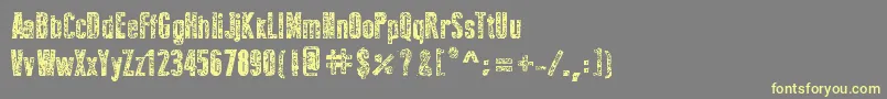 NewPressErodedBold Font – Yellow Fonts on Gray Background