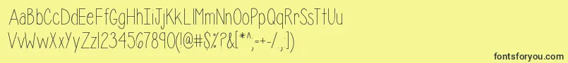 IsabelleLayne-Schriftart – Schwarze Schriften auf gelbem Hintergrund