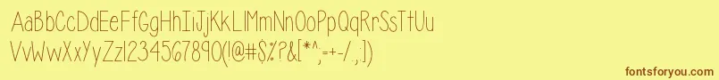 IsabelleLayne-Schriftart – Braune Schriften auf gelbem Hintergrund