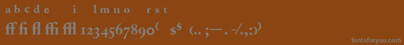Fonte AdobeCaslonBoldExpert – fontes cinzas em um fundo marrom