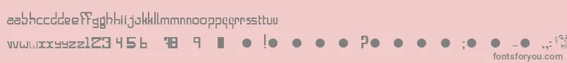 フォントAlphabeta – ピンクの背景に灰色の文字