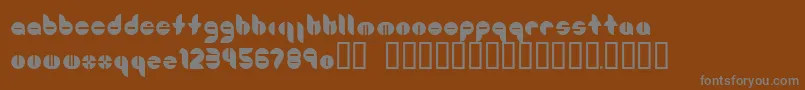 Шрифт Bouncer ffy – серые шрифты на коричневом фоне