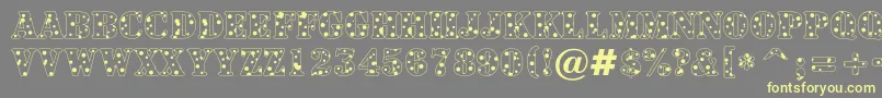 ASignboardtituldrp Font – Yellow Fonts on Gray Background