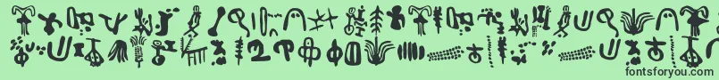 IngaStoneSigns-Schriftart – Schwarze Schriften auf grünem Hintergrund