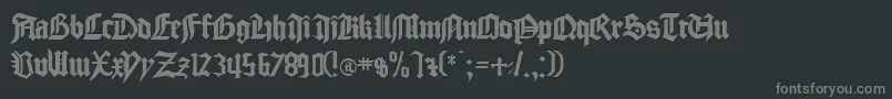 フォントGocmp – 黒い背景に灰色の文字