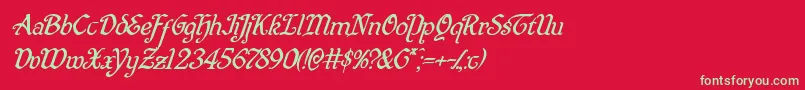 フォントQuillswordsuperital – 赤い背景に緑の文字