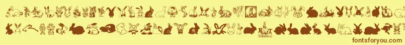 フォントRabbit – 茶色の文字が黄色の背景にあります。