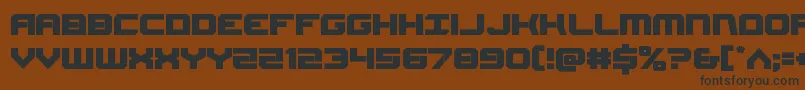 フォントGearhead – 黒い文字が茶色の背景にあります