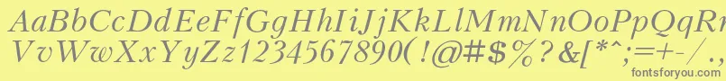 KudrashovcItalic Font – Gray Fonts on Yellow Background