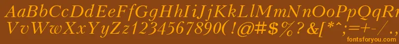 KudrashovcItalic Font – Orange Fonts on Brown Background