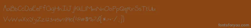 2peasMelissa Font – Gray Fonts on Brown Background