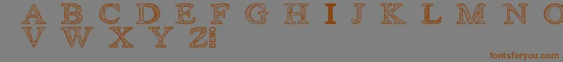 Zsyraphdemo Font – Brown Fonts on Gray Background