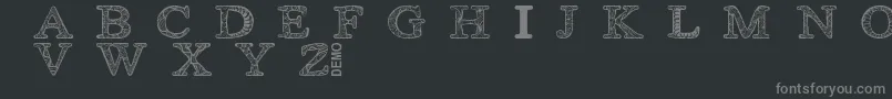 Шрифт Zsyraphdemo – серые шрифты на чёрном фоне
