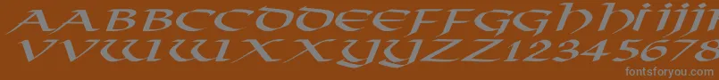 VikingNormalExItalic-fontti – harmaat kirjasimet ruskealla taustalla