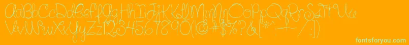 Шрифт SilverBellybuttonRingReg – зелёные шрифты на оранжевом фоне