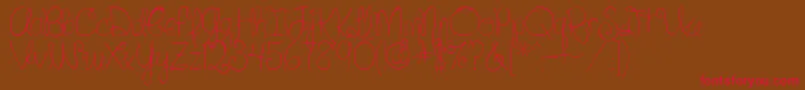 SilverBellybuttonRingReg-Schriftart – Rote Schriften auf braunem Hintergrund