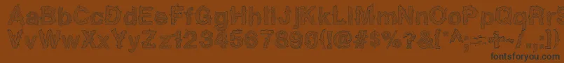 NadcSpaghettica Font – Black Fonts on Brown Background