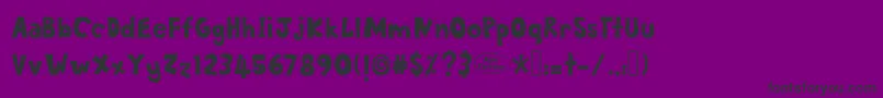 フォントSayangMakabah – 紫の背景に黒い文字