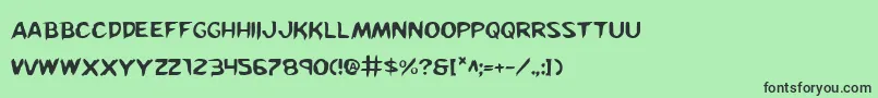 Kreeture Font – Black Fonts on Green Background