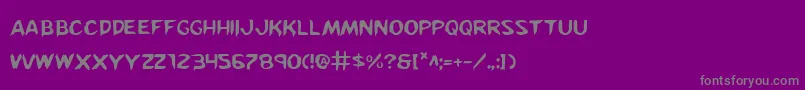Kreeture-fontti – harmaat kirjasimet violetilla taustalla