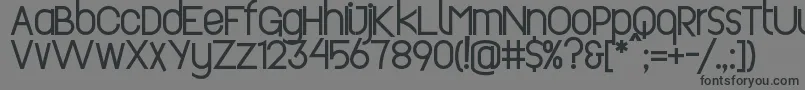 Revopop Font – Black Fonts on Gray Background