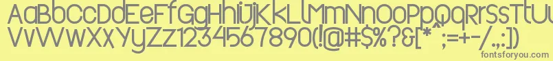 Шрифт Revopop – серые шрифты на жёлтом фоне