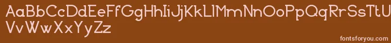 Czcionka BasicallySerifFreeVersion – różowe czcionki na brązowym tle