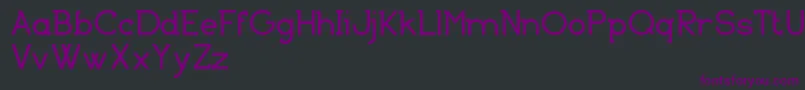 Czcionka BasicallySerifFreeVersion – fioletowe czcionki na czarnym tle