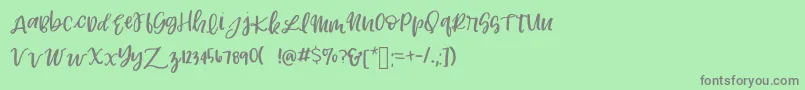 フォントLexingtonRegular2 – 緑の背景に灰色の文字