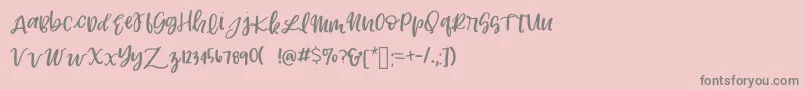 フォントLexingtonRegular2 – ピンクの背景に灰色の文字