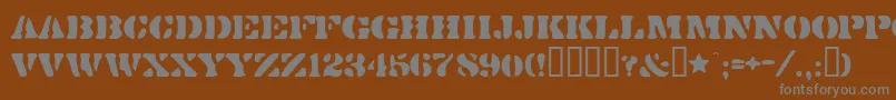 Dirtybakersdozen-fontti – harmaat kirjasimet ruskealla taustalla