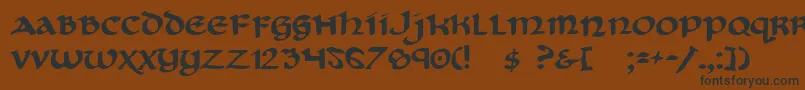 フォントCryUncial – 黒い文字が茶色の背景にあります