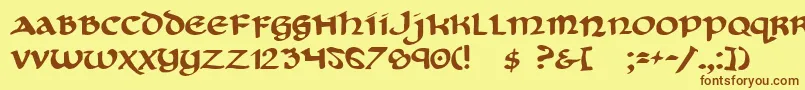 フォントCryUncial – 茶色の文字が黄色の背景にあります。