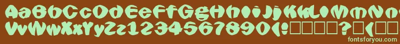 Goldfish Font – Green Fonts on Brown Background