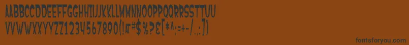 フォントSfFerretopia – 黒い文字が茶色の背景にあります